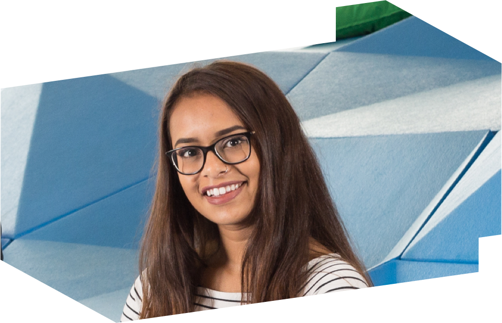 Biomedical Engineering student Taspia Wahid sits on an architectural sculpture in the Sandbox at the Student Learning Centre at Ryerson University.