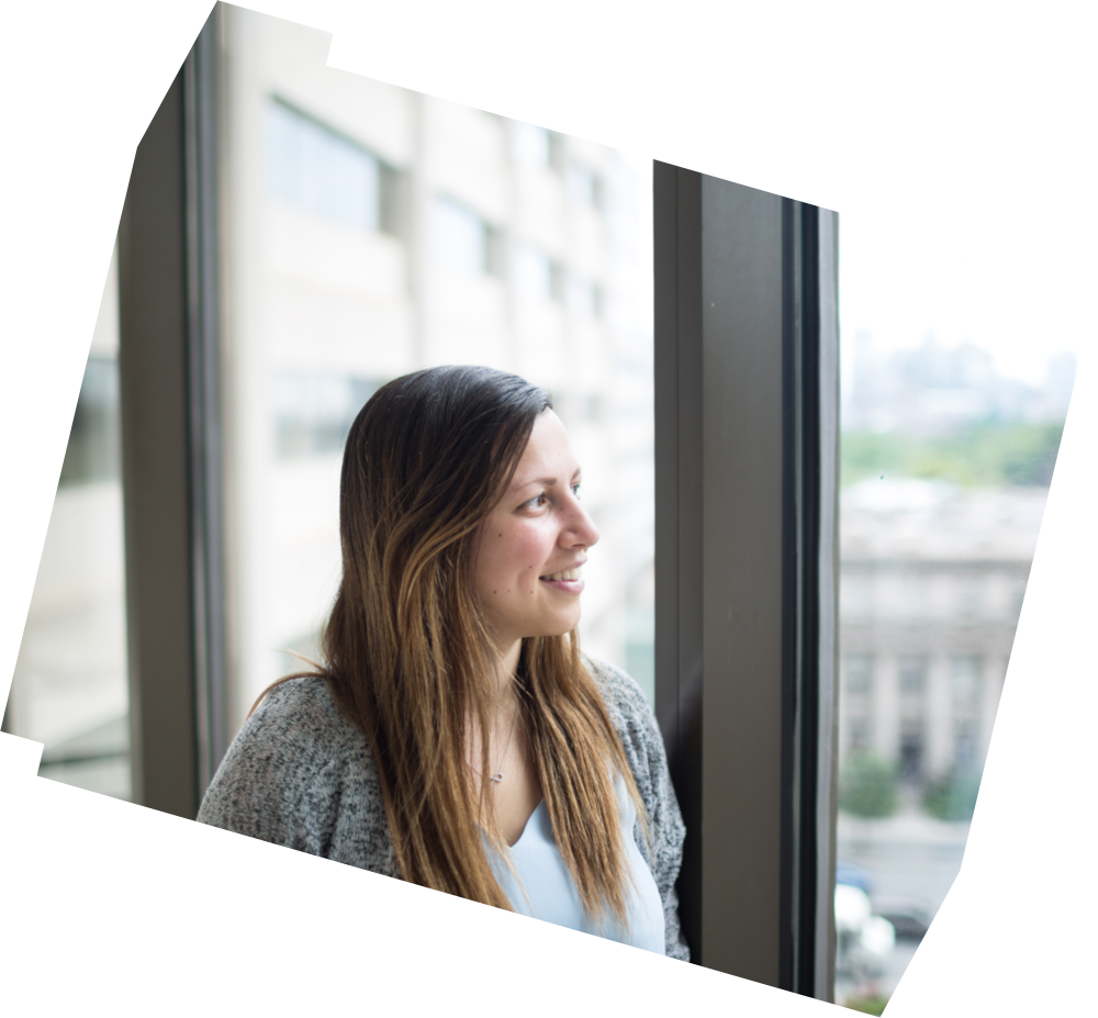 Ryerson student Jennifer Eshoua looks out the window to the city skyline.